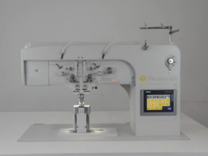 2AI – Double needle, triple feed, post bed, lockstitch sewing machine with automatically adjustable needle distance for decorative stitching