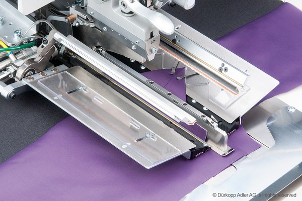 10-1.jpg Duerkopp Adler 755S – Sewing unit for runstitching of rectangular piped pockets, flap pockets and welt pockets