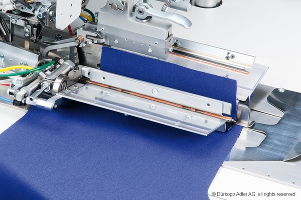 7-4.jpg Duerkopp Adler 755S – Sewing unit for runstitching of rectangular piped pockets, flap pockets and welt pockets