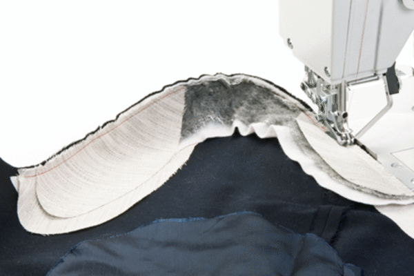 Risunok9.png Durkopp Adler 610-10 – Optimized work station for taping operations respective for pre-ruffeling of sleeves