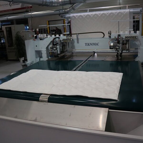 Teknomac TK 491 Mattress Panel Cutting/Serging Machine