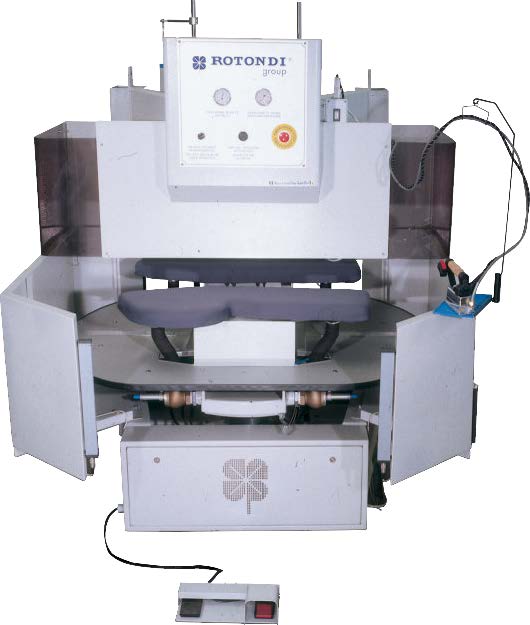 Rotondi 18RD P-17 180 degree rotation carousel for dart and side seam opening and pocket welt pressing. Equipped with Leonardo computer
