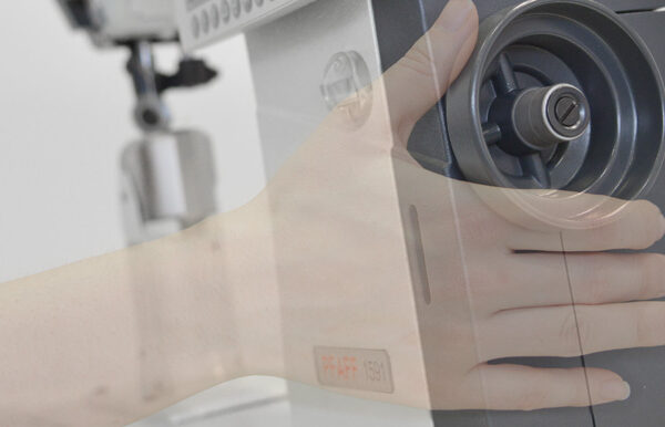 PFAFF 571  Post bed special sewing machine with wheel feed, roller presser and needle feed (left post)