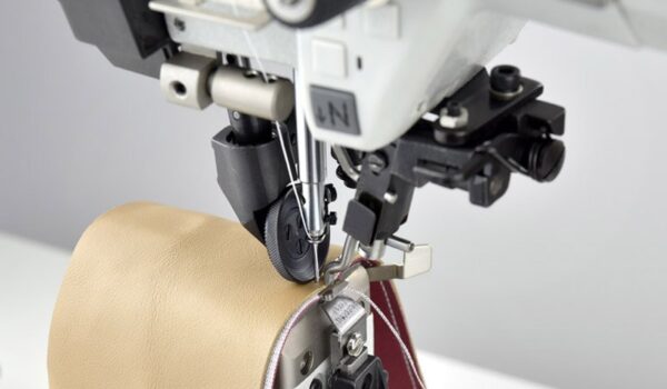 PFAFF 571  Post bed special sewing machine with wheel feed, roller presser and needle feed (left post)